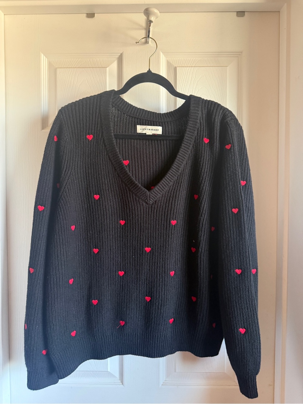 Lucky Brand Black V-Neck Sweater with red Heart Motif (Never worn)